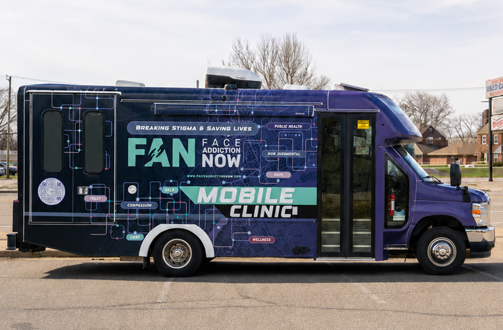 The FAN mobile clinic van, wrapped in purple with 'Mobile Clinic — Breaking stigma and saving lives'